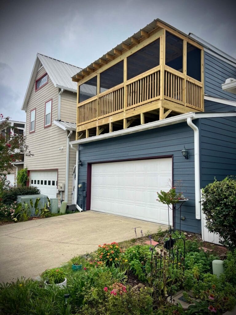 Screened-in porch construction finished project providing a comfortable outdoor space protected from bugs, perfect for relaxing and enjoying fresh air in Helena, Alabama