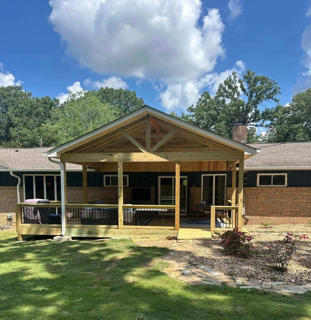 Beautiful covered deck and fence project completed in Bluff Park! The old, weathered deck is now a fully upgraded outdoor living space with railing, lighting, and a ceiling fan for summer comfort.
